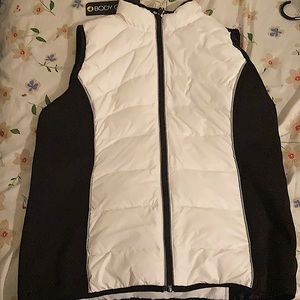 Body glove, has two pockets with zipper, black material is very soft.